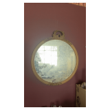 Antique round mirror