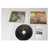 2 Vintage Elvis Presley 45s in original sleeves ("Long Tall Sally/Heartbreak Hotel" & "Judy/There