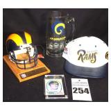 Variety of Rams Items: LA Rams Riddell Helmet, Large Mug, St. Louis Rams Leather Bill Hat, & Roman Gabrine card
