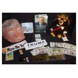 Variety of Donald Trump Items: Coffee Table Book, Mask, Golf Head Cover, Money, Bumper Stickers, Stickers, Baseball Card etc.