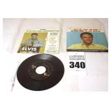2 Vintage Elvis Presley 45s in original sleeves ("Spin Out/All That I am" & " Surrender/Big Boss Man") & additional 45 stored in sleeve