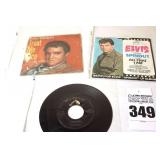 2 Vintage Elvis Presley 45s in original sleeves ("All That I Am.Spinout & I Gotta Know/Are You Lonesome Tonight" & Treat Me Nice/Spin Out") & additional 45 stored in sleeve