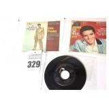 2 Vintage Elvis Presley 45s in original sleeves ("Head Headed Woman/Jailhouse Rock" & "Little Sister etc.) & additional 45 stored in page protector
