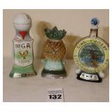 3 Vintage Jim Beam Liquor Decanters: 1971 Western Open Championship (WGA) -ceramic, 1972 Hawaiian Open Pro-Am (shaped like a pineapple) - ceramic, & 1970 Bing Crosby Natonal Pro-Am -ceramic