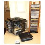 2 CD Holders & carry case: Wood & rotating plasic with variety of CD included - Rolling Stones, John Fogerty, Doors, Lynyrd Skinner, Dean Martin, Willie Nelson, Johnny Cash, Gospel, Rod Steward, Alaba