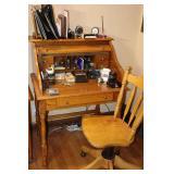 Wood Roll Top Desk (44"x32.5"x24") with Wood rolling Chair(36"x24"x16") - Desk has drawers and divided sections - all items in and on desk included (staplers, notebooks, pads, pens, clock, sharpeners,