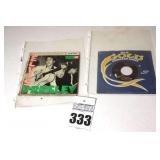 2 Vintage Elvis Presley 45s in original sleeves ("Just Bear/Blue Love" & "Blue Suede Shoes/Tutti Frutti") & additional 45 stored in sleeve