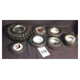 7 Vintage Ashtrays/Coasters with Tire shapes and company names (Bridgestone, Good Year, etc.)