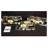 3 US Army Die Cast Race Cars: 2 -  2003 are in box (2different styles) & 2004 on Stand
