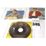 2 Vintage Elvis Presley 45s in original sleeves (You