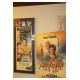 2 Movie Posters: "Three Strips in the Sun" - Professionally mounted with "Wolfhound" Division 49"x19"& Mad Max Poster (some minor damage on edge) 36"x24" - additional framed picture of wolf  (not pict