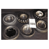 6 Vintage Ashtrays/Coasters with Tire shapes and company names (Bridgestone, Good Year, etc.)