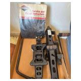 2 Jacks, Tire Iron and a Briggs and Stratton Repair Book