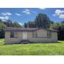 "Handyman Special!" Full Remodel or Tear Down with No City Taxes in Great Location!