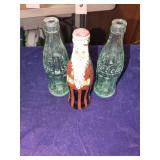 3 Coke Bottles - One Painted with Christmas Santa