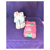 Blue Sky Clayworks Tea Light House designed by artist Heather Goldminc and Holiday Towels