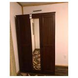 Three-Door Wooden Wardrobe with Mirrored Center Door and Interior Shelving