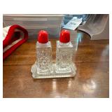 Miniature Clear Glass Pressed Pattern Salt and Pepper Shakers Set with Tray and Red Plastic Lids