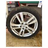 Nissan Factory Aluminum Wheel with Firestone Champion Tire
