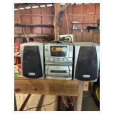 Emerson Portable Shelf Stereo System Equipped with a CD Player, a Cassette Deck, and Detachable Dual Speakers - Condition Unknown