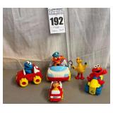 Collection of Sesame Street Characters and Toys