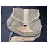 Lodgepole fishing satchel by fish pond