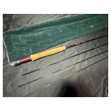 Graphite fly fishing rod. A.