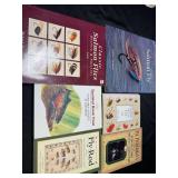 Fly fishing reference materials.