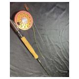 Fly fishing reel with rod