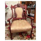 Vintage Victorian-Style Carved Mahogany Armchair with Shield Back and Floral-Patterned on Casters