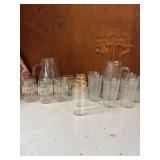“By Cracky” Pitcher and 6 Glasses, 4 Gold Rimmed Juice Glasses, Grape and Fruit Pitcher and 5 Barrett Collin’s Barrel Shaped Frosted Glasses