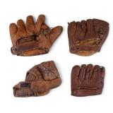 Four Mid 20th Century Baseball Gloves