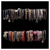 Collection of Approximately 75 Bangle Bracelets Fe