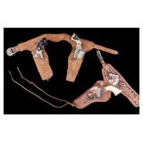 Western Toy Guns in Holsters and 2 Toy Bullets