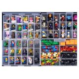 Four Containers of Lego Minifigures