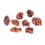 Eight Carved Wooden Netsuke