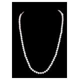 Pearl Necklace With 18K Gold, Diamond, and Emerald