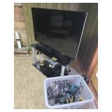 flatscreen tv w/stand and contents