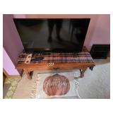 flat screen tv and table plus headset