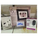 DIGITAL PICTURE FRAME/ CAMERA AND EAR BUDS