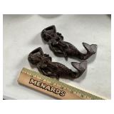 Cast iron mermaids