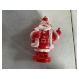 Plastic Santa piggy bank missing bottom