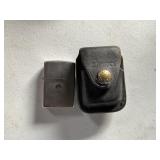 Zippo lighter in a leather Zippo case