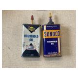 Two Sunoco household oil one open and one