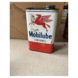 Mobilube for gears can has some fluids