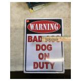 Warning bad dog on duty sign