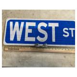 Double sided West St sign