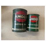 Two Amoco cans, one open, one unopened