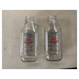 Two Homestead Creamery Milk bottles