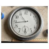 Clock with temperature gauge on it